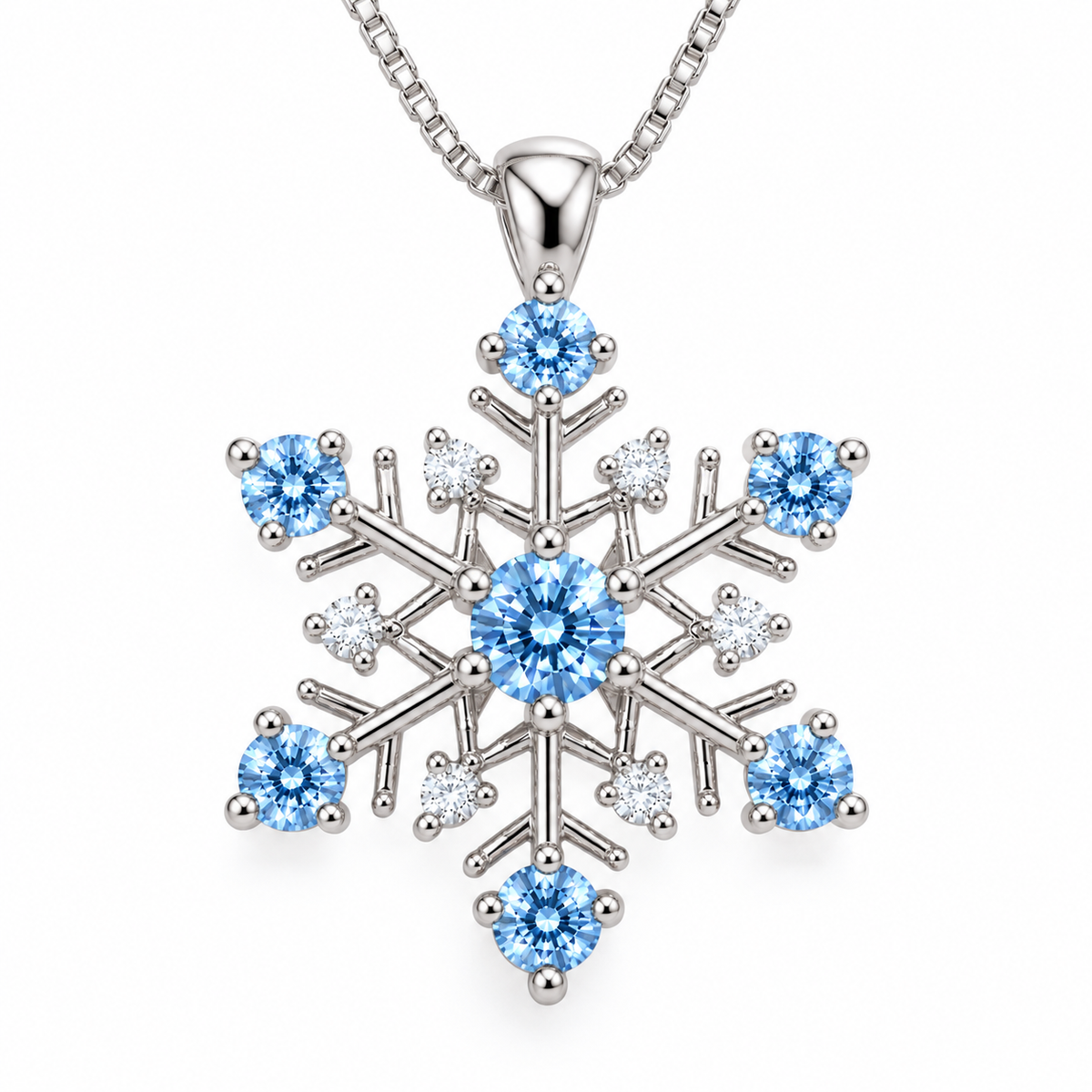 Detailed top-down view of a six-point snowflake moissanite necklace featuring a 4mm icy blue round brilliant center stone, six matching 3mm blue moissanite gemstones and six clear cubic zirconia accents in polished 925 sterling silver.