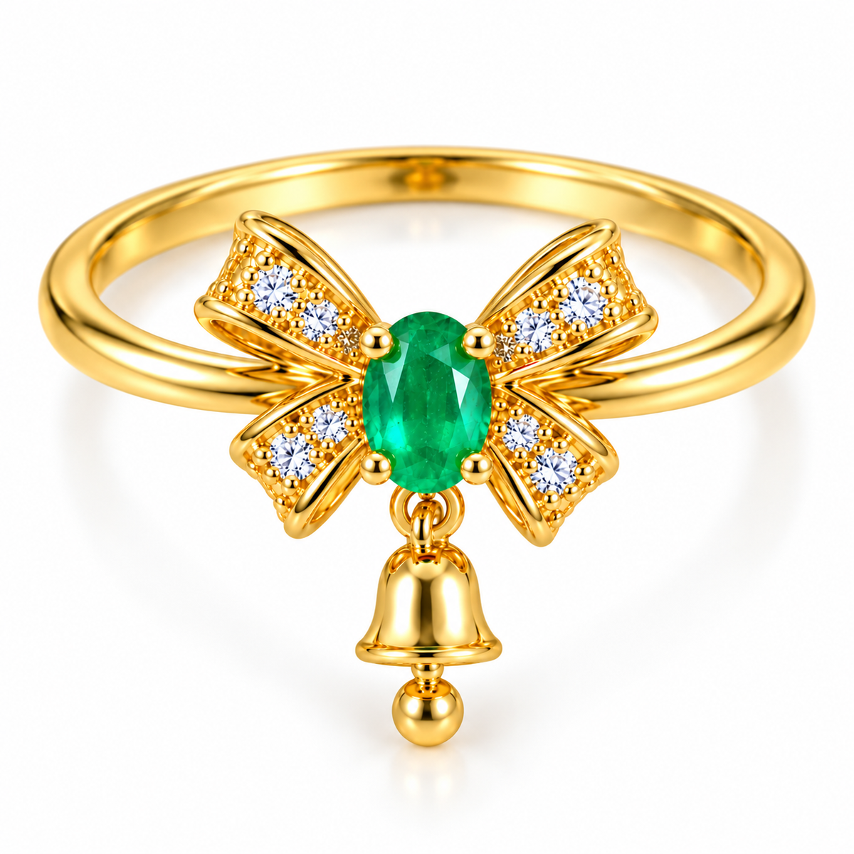 Elevated view of a delicate natural emerald bow ring featuring a 3x4mm oval green gemstone, four gold ribbon sections with clear CZ accents and a dangling polished gold bell on a white background.