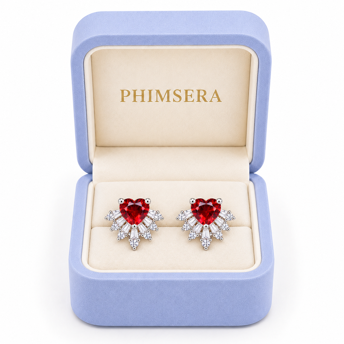 Natural red garnet heart stud earrings with 6mm gemstones and sparkling cubic zirconia accents displayed inside an open periwinkle Phimsera jewelry gift box with ivory interior and gold Phimsera logo.