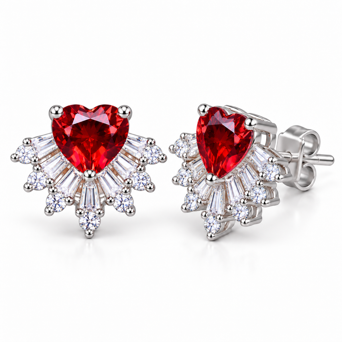Angled view of natural 6mm heart-cut garnet stud earrings displaying rich crimson-red gemstones, sparkling cubic zirconia fan accents, polished sterling silver settings, and butterfly-back closures.