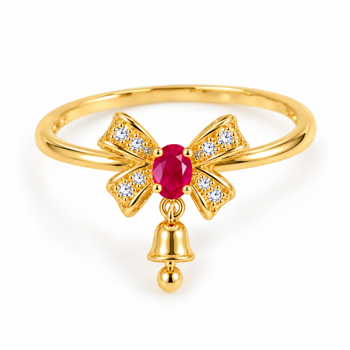 Elevated view of a delicate natural ruby bow ring featuring a 3x4mm oval red gemstone, four gold ribbon sections with clear CZ accents and a dangling polished gold bell on a white background.