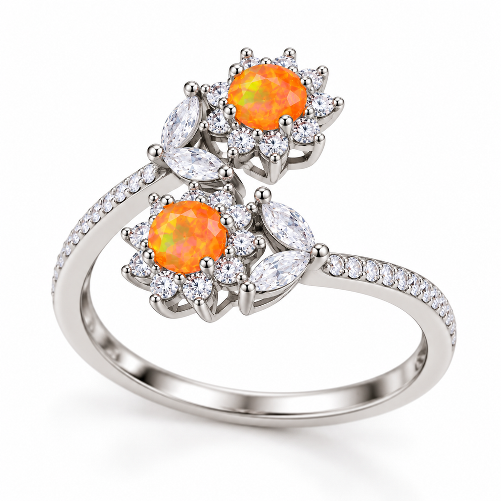 Side profile of an orange fire opal ring highlighting the raised floral gemstone settings, marquise-shaped clear accents, and curved silver-tone band.