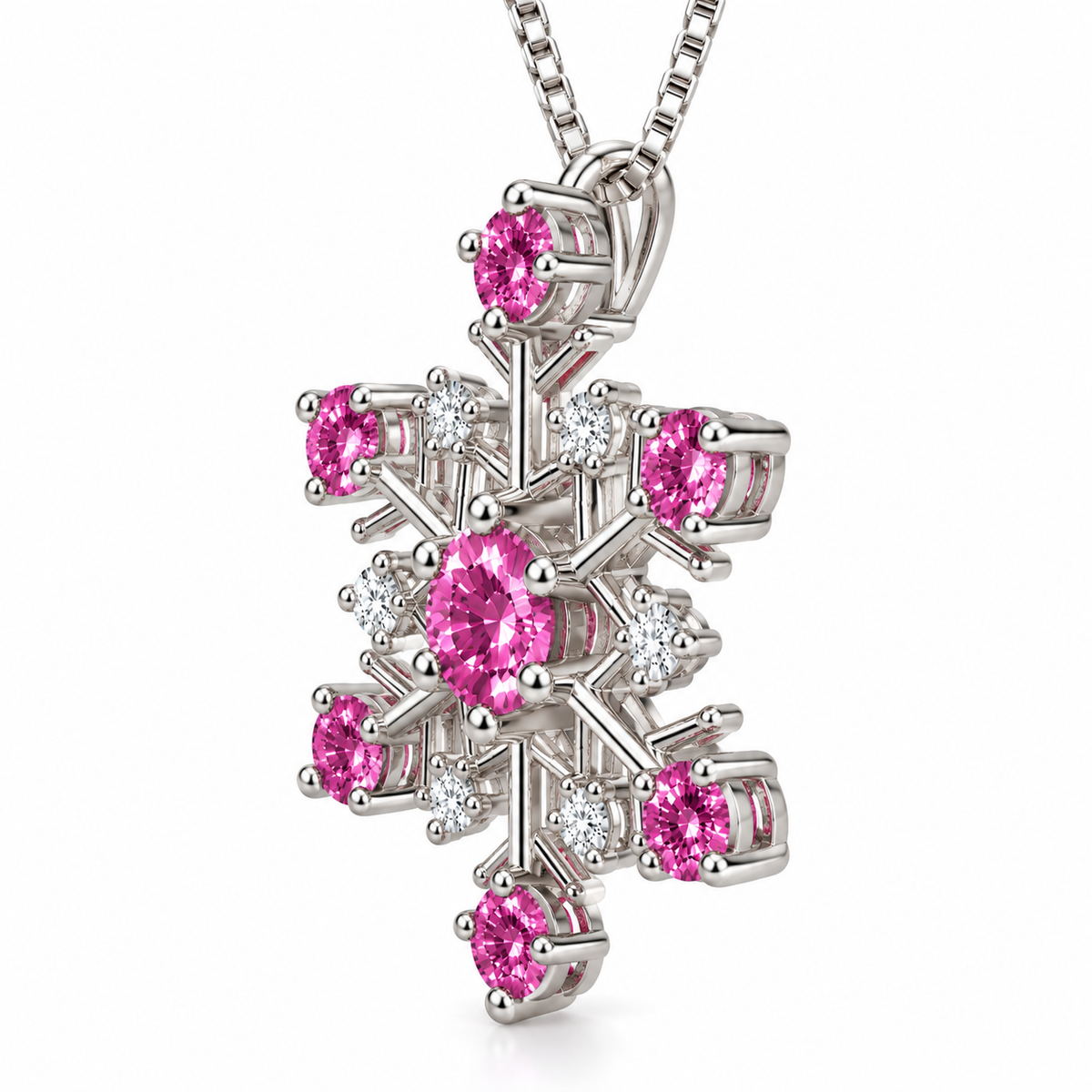 Side profile of a pink moissanite snowflake pendant highlighting the raised gemstone baskets, polished 925 sterling silver prongs, openwork snowflake structure and delicate silver chain.