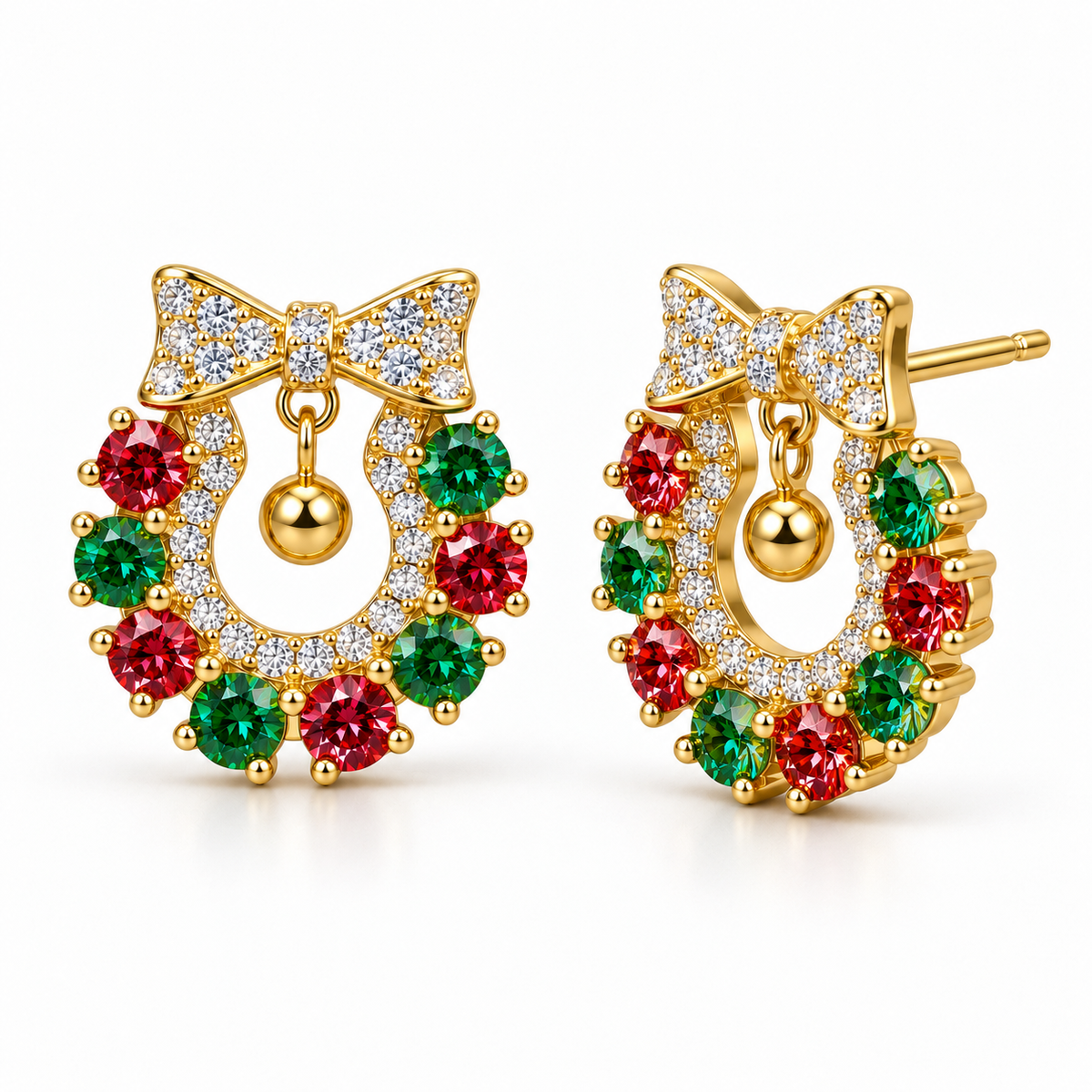 Angled product photograph of red and green moissanite Christmas wreath earrings showing sparkling white CZ bows, polished gold ornaments and festive gemstone settings against a white background.