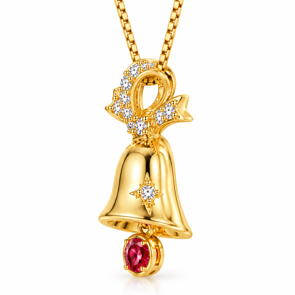 Side profile of gold-plated sterling silver Christmas bell pendant showing its curved polished body, CZ-set star detail, raised ribbon bow and dangling 3mm red moissanite gemstone.