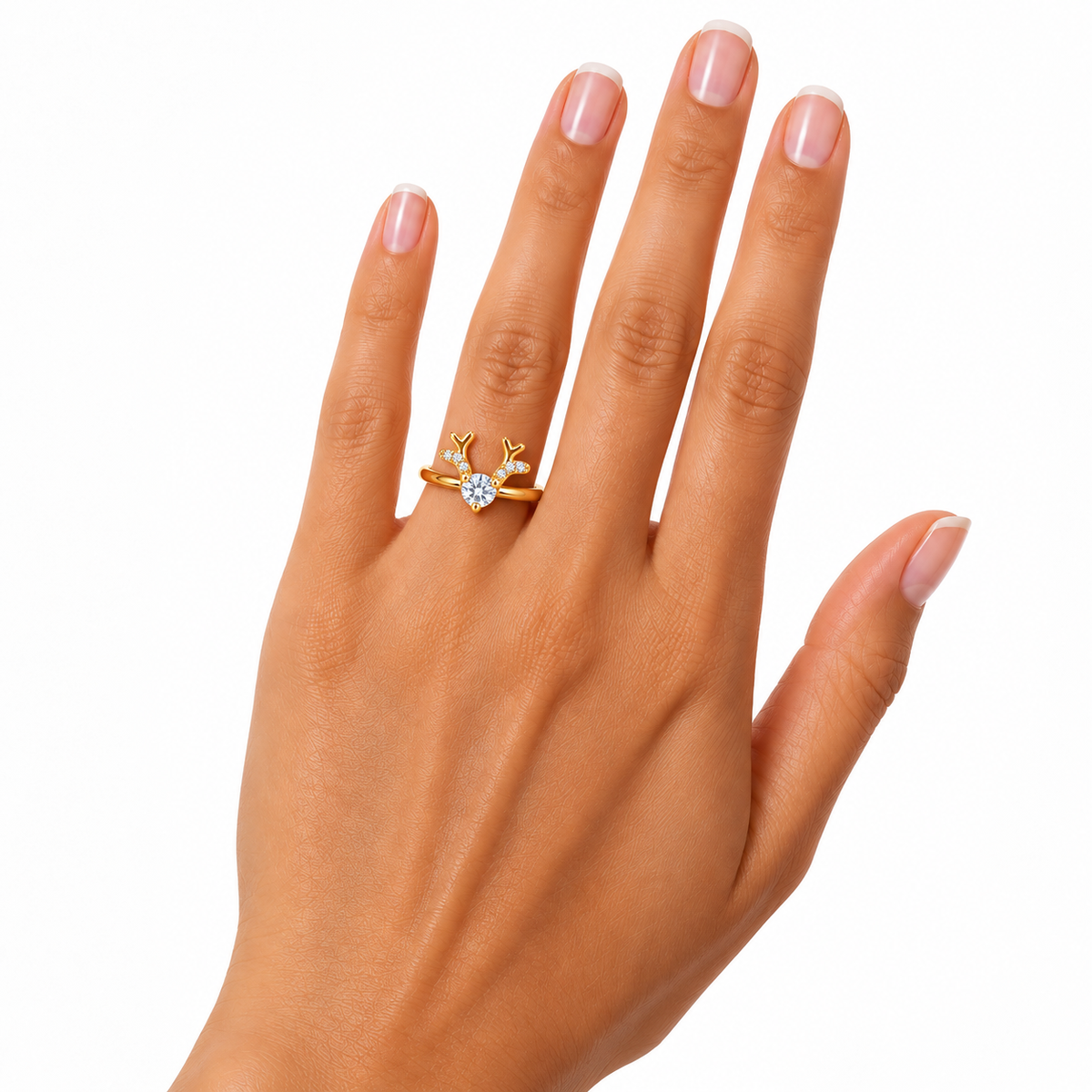 Gold-plated Christmas reindeer antler ring worn on a woman's ring finger, featuring a true-to-size 4mm round white moissanite gemstone and delicate CZ-accented antlers.