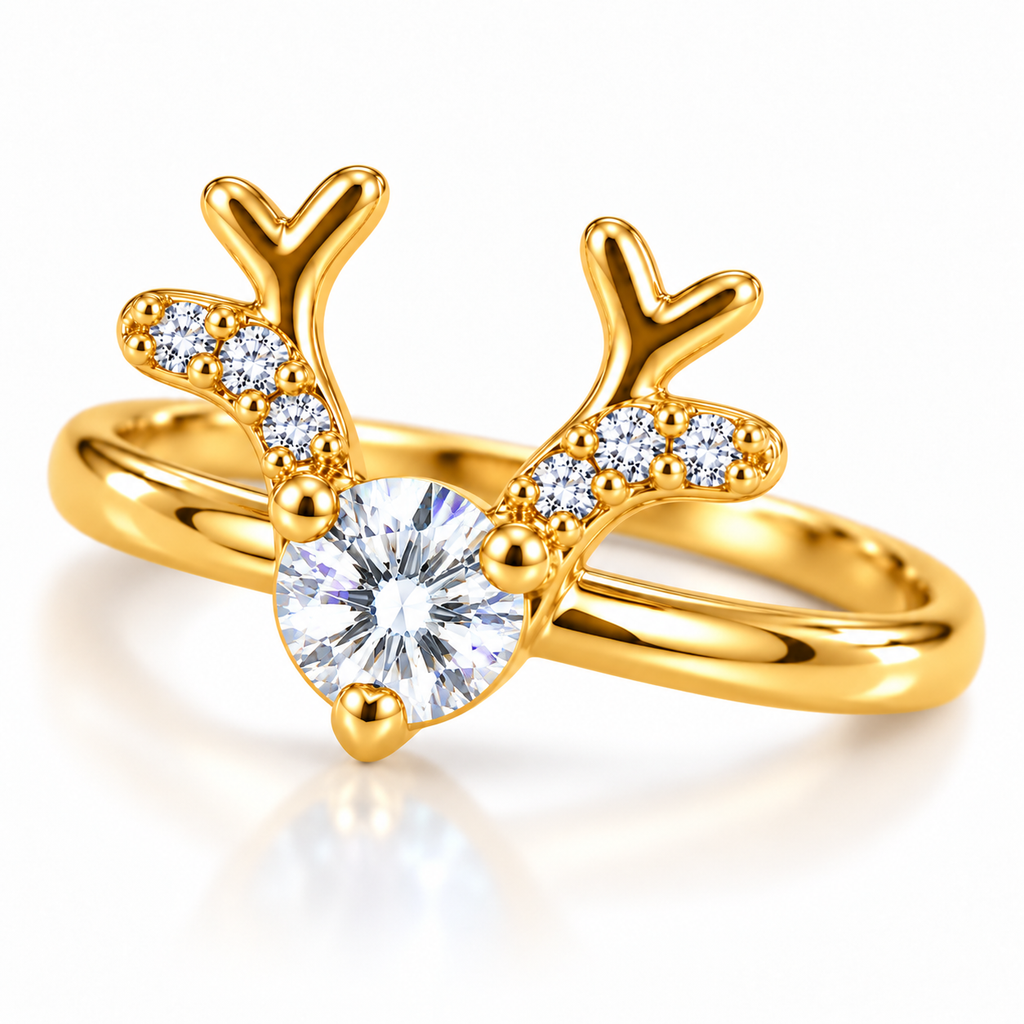 Angled view of a gold-plated sterling silver Christmas reindeer ring featuring a 4mm round brilliant white moissanite gemstone and symmetrical CZ-decorated golden antlers.