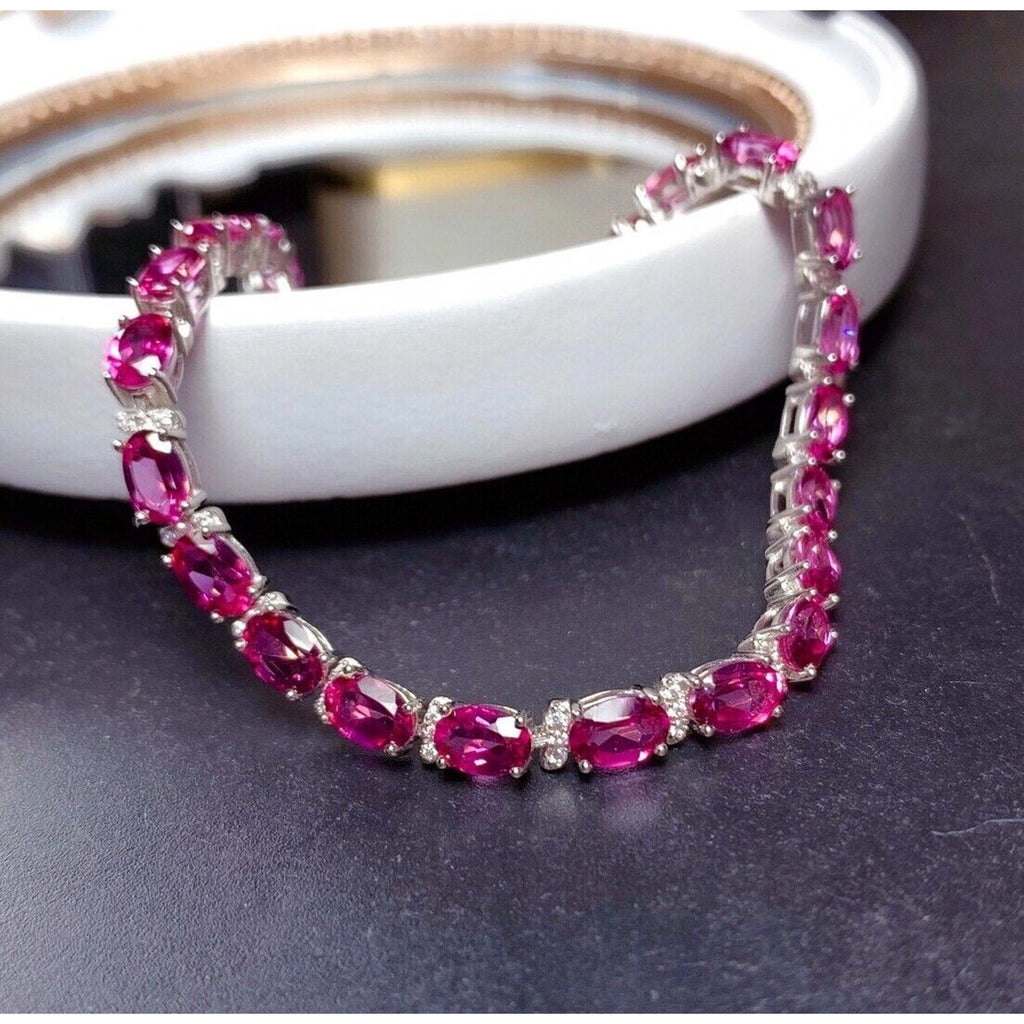 Natural Oval Cut Pink Topaz Tennis Bracelet on Platinum Plated Sterling Silver