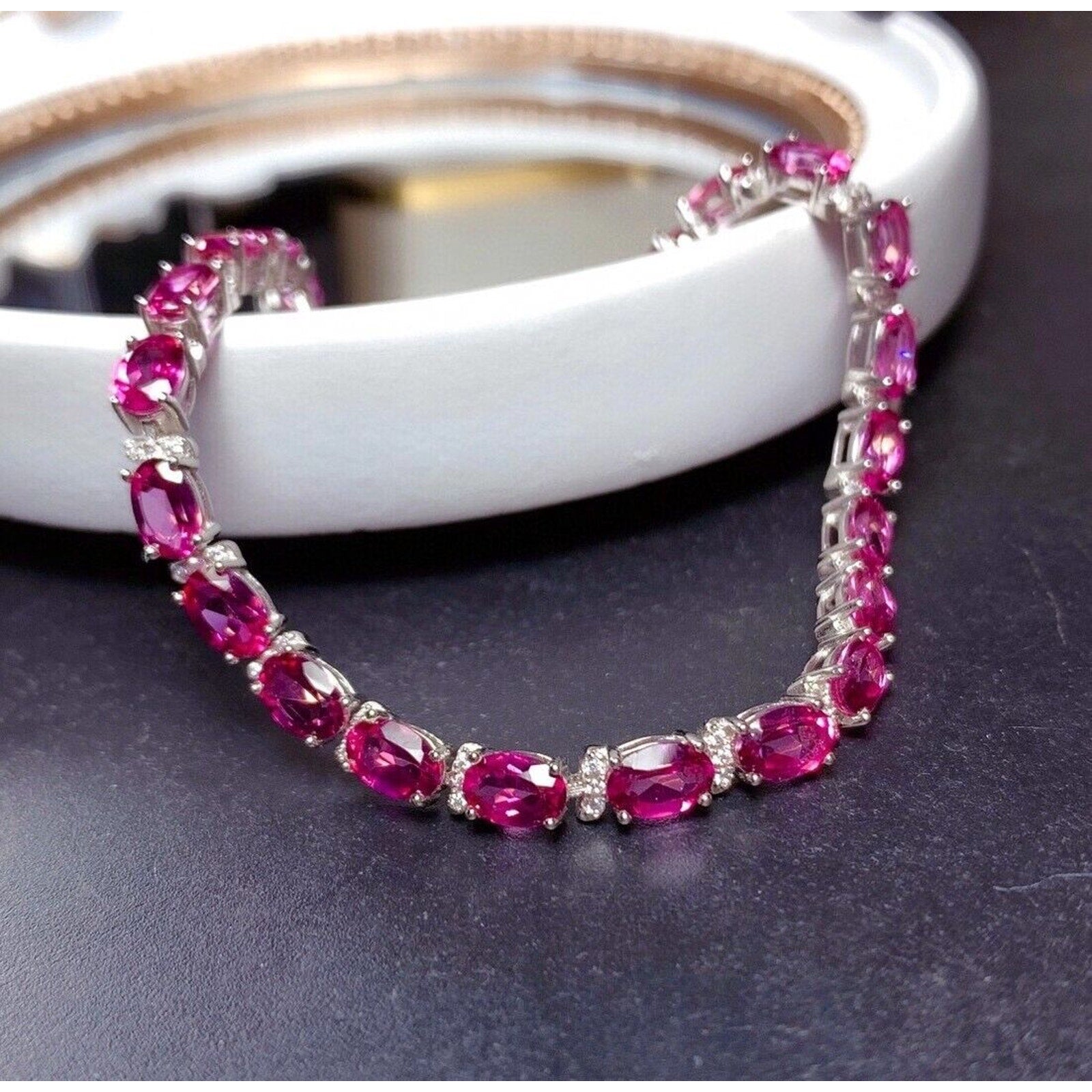 Natural Oval Cut Pink Topaz Tennis Bracelet on Platinum Plated Sterling Silver