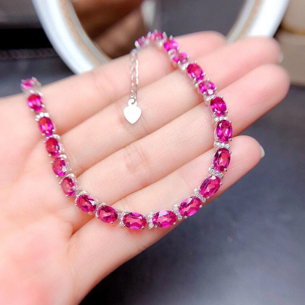 Natural Oval Cut Pink Topaz Tennis Bracelet on Platinum Plated Sterling Silver